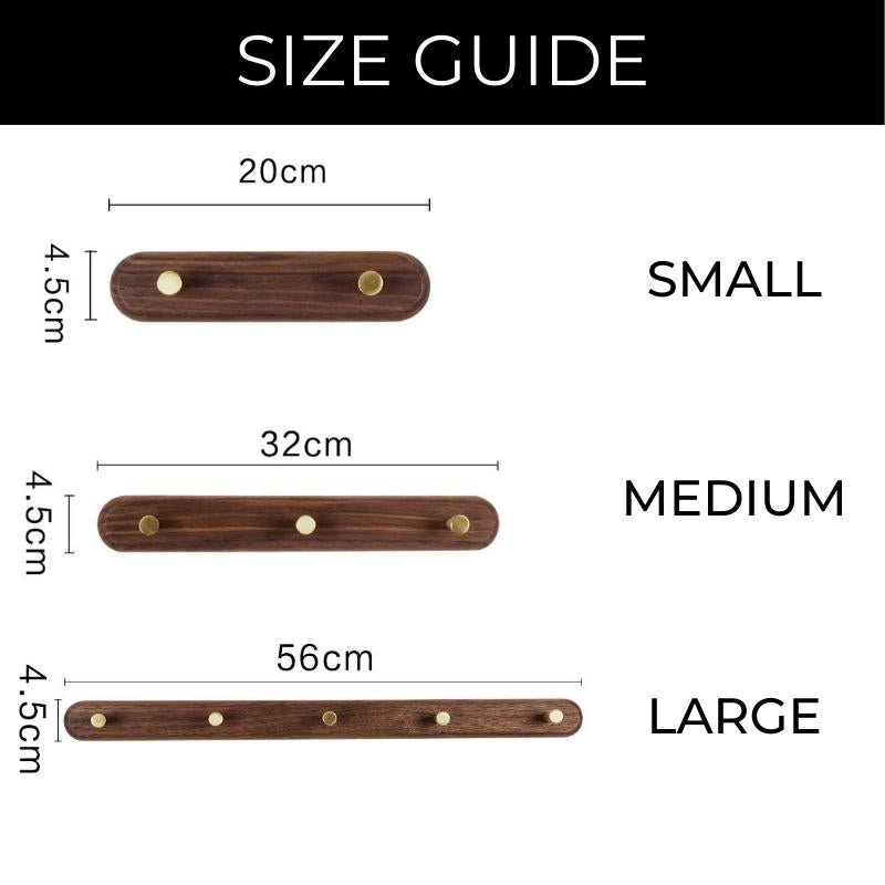 Størrelsesguide til vægmonteret knagerække i træ med messingknopper. Fås i tre størrelser: lille (20 cm), medium (32 cm), stor (56 cm).