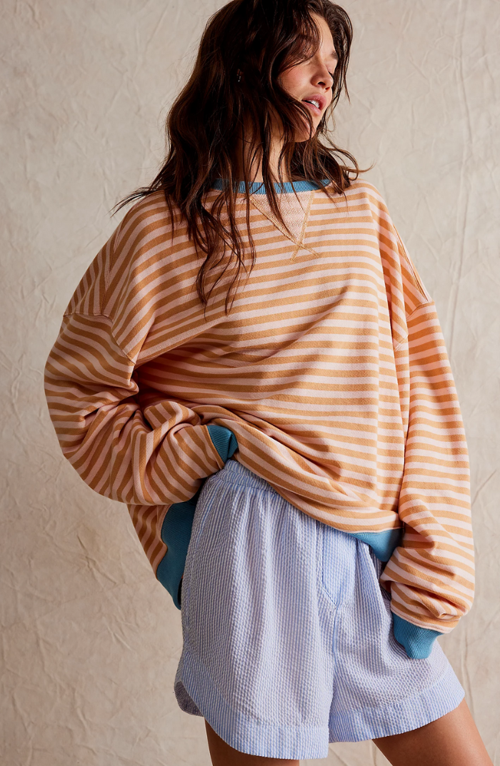 Elyna | Oversized svetr s pruhy - sezónní must-have v módě