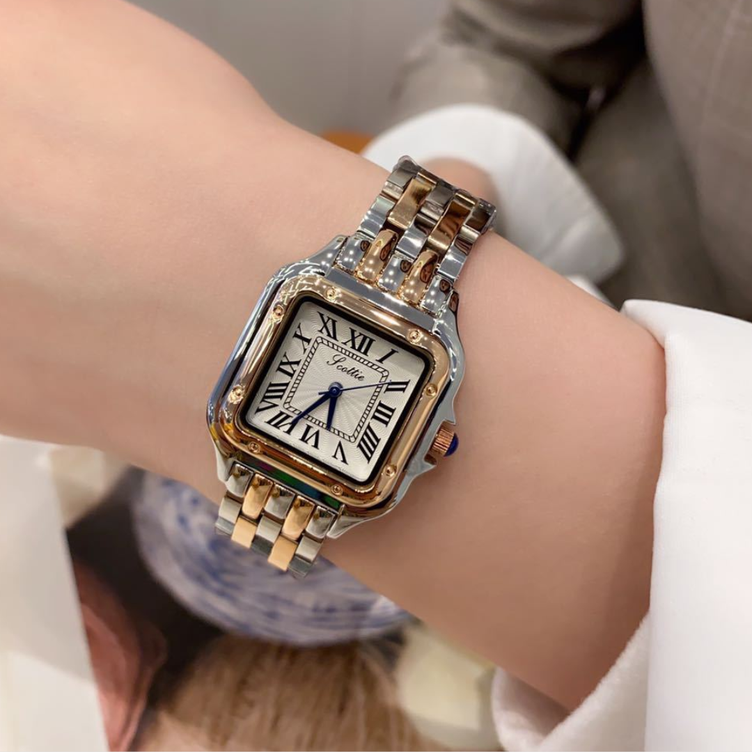 Kvadratisk ur med romertal, tofarvet metalrem, elegant design. Stilfuldt dameur, klassisk look, luksus tilbehør, modeaccessory.