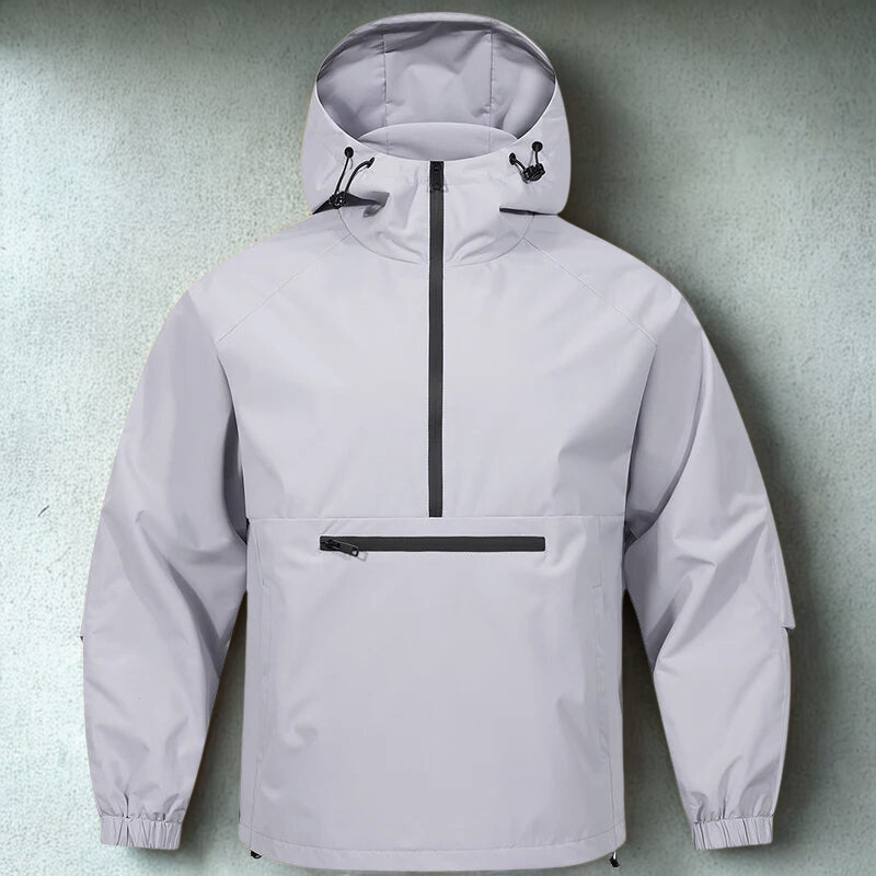 Grå anorakjakke med hætte, lynlås og forreste lomme. Vandtæt og vindtæt design, ideel til udendørsaktiviteter. Moderne og funktionel stil.