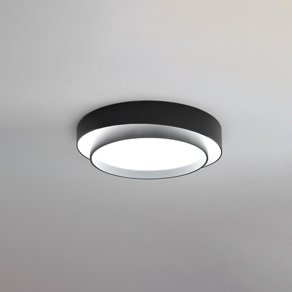 Moderne sort loftlampe med rund LED-lysdesign, energibesparende belysning til stue eller kontor, minimalistisk og stilfuldt interiør.