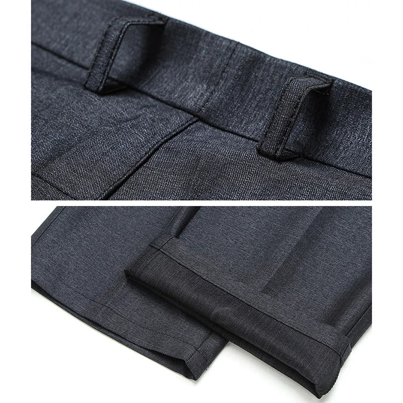 Mørkeblå herrebukser i uldblanding, tæt på linning og søm. Klassisk design, høj kvalitet, ideel til formelle lejligheder.