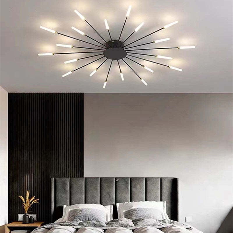 Moderne loftlampe i stjerneformet design med LED-lys over en stilfuld seng i et minimalistisk soveværelse. Elegant belysning, moderne indretning.