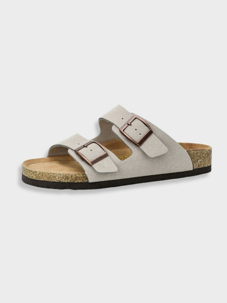 Grå Birkenstock sandal med to justerbare remme og korksål, komfortabel fodtøj til sommer, populær sandal til mænd og kvinder.