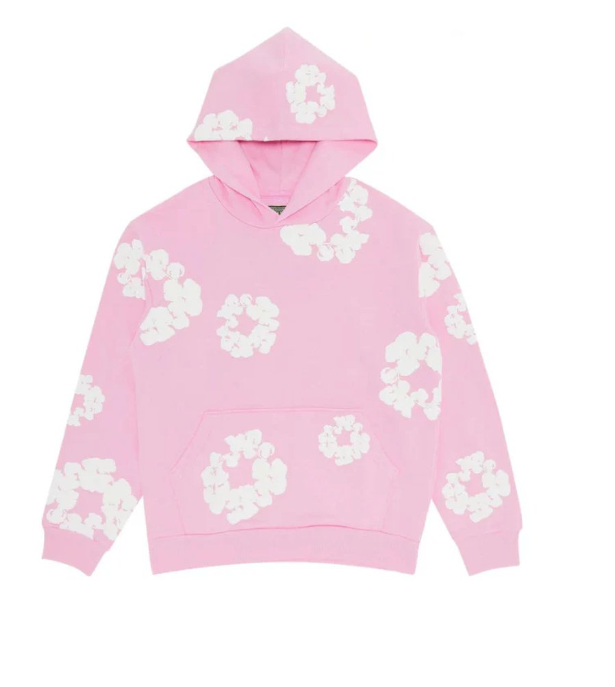 Lyserød hættetrøje med hvide blomsterprint, unisex design, blød bomuld, trendy streetwear, perfekt til afslappet stil og modebevidste unge.
