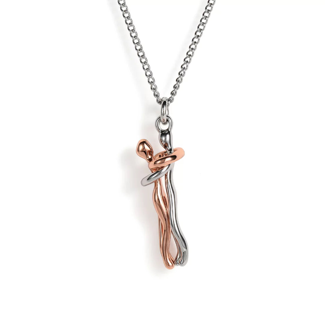 Sølv- og rosaguldkæde med moderne, abstrakt vedhæng. Unikt smykkedesign, elegant halskæde, stilfuldt tilbehør til kvinder.