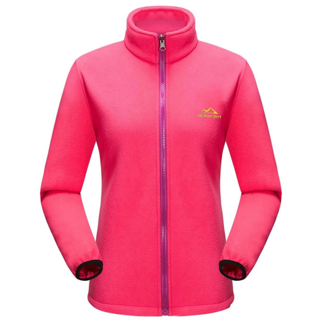 Lyserød fleecejakke til kvinder med lynlås og høj krave, velegnet til udendørs sport. Komfortabel og varm beklædning til efterår og vinter.