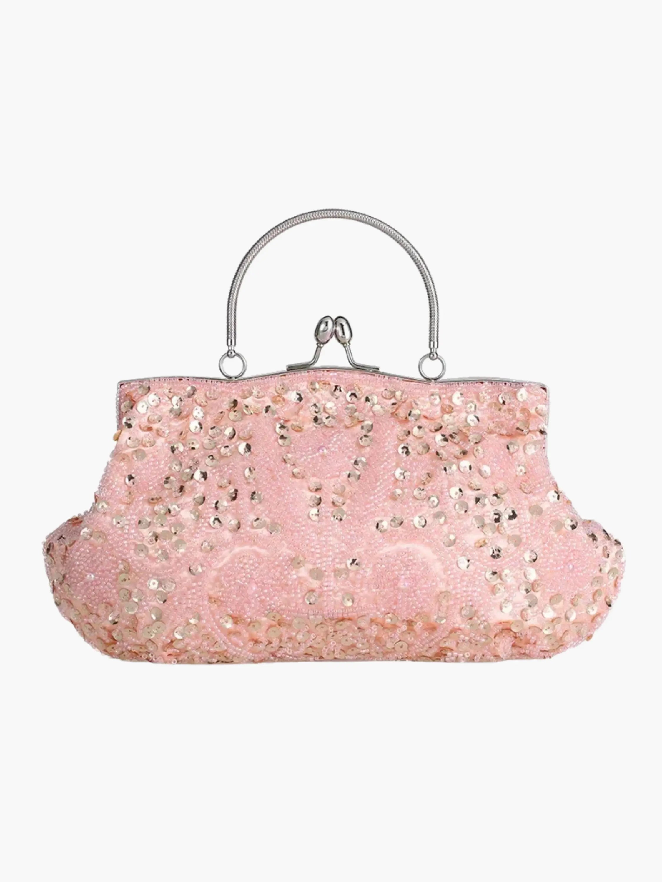 Lyserød håndtaske med pailletter og metalhank. Elegant design, perfekt til festlige lejligheder. Trendy modeaccessory til kvinder.