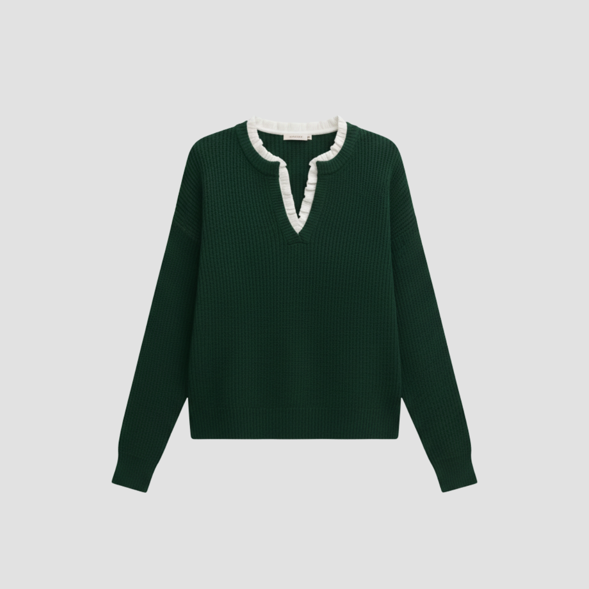 Pull tricoté pour femmes avec bord ondulé et col roulé élégant