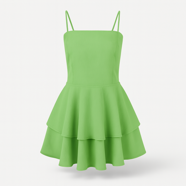 Green mini dress with overlapping ruffles, spaghetti straps and airy cut