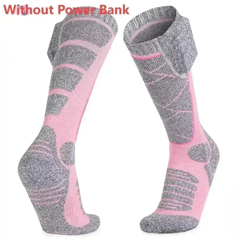 Grå og pink opvarmede sokker uden powerbank, designet til udendørs aktiviteter. Komfortable og varme, ideelle til vinterbrug og sport.