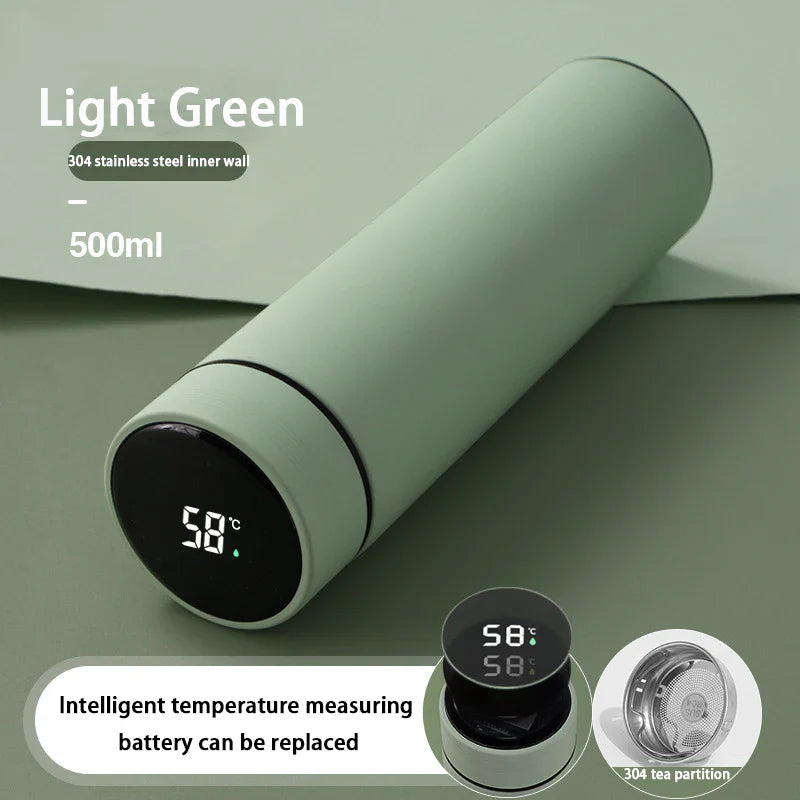 Lys grøn termoflaske 500ml med 304 rustfrit stål, intelligent temperaturmåler og udskifteligt batteri. Perfekt til te og varme drikke.