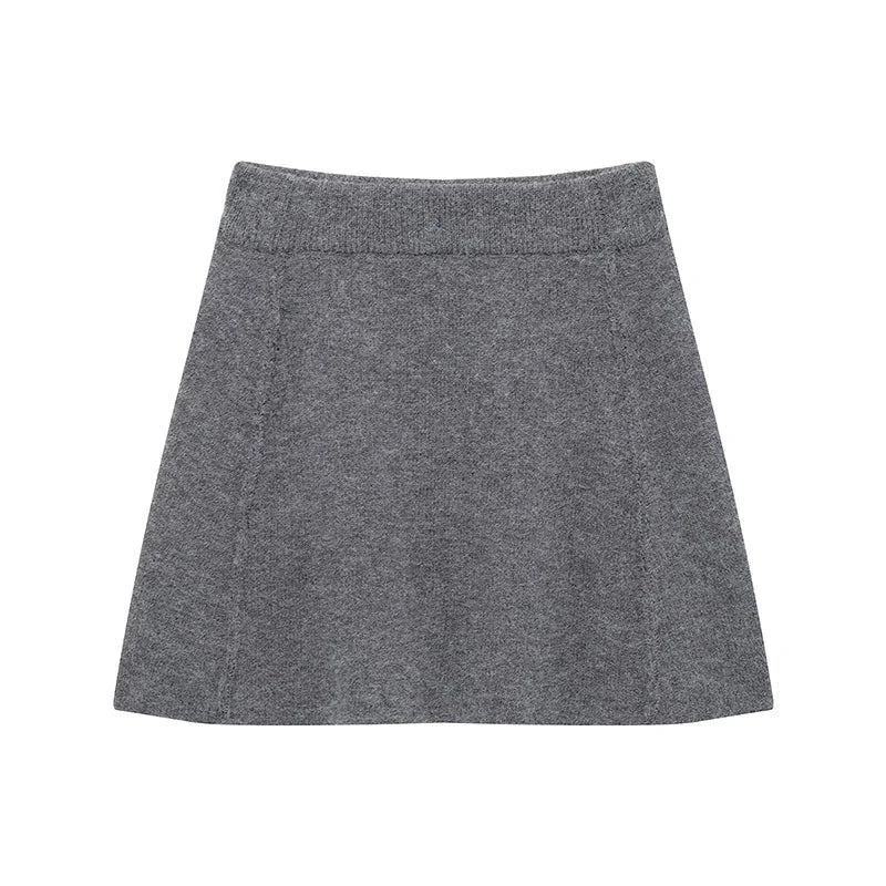 Grå uldnederdel til kvinder, A-line design, minimalistisk stil, velegnet til efterår og vintermode, komfortabel og stilfuld beklædning.