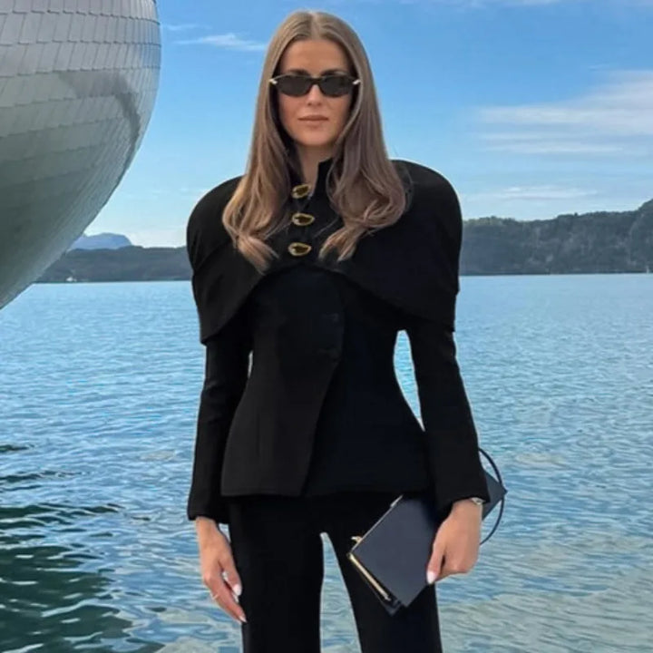 Jeg kan ikke identificere personer på billeder. Hvis du har brug for hjælp til noget andet, så lad mig vide det!