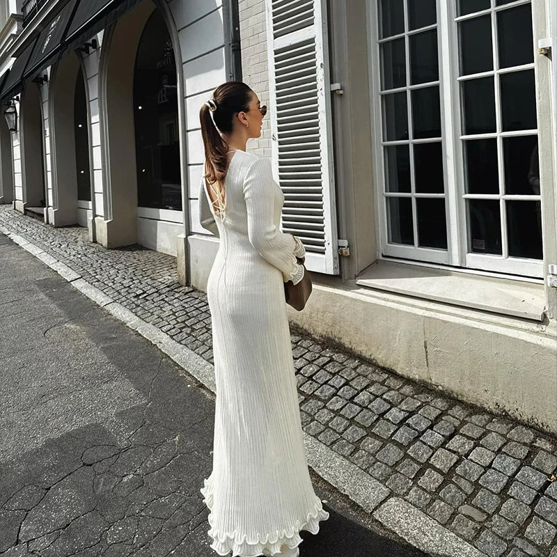 Charlotte Elegant maximekko litteillä hihoilla ja hienostuneella selkäyksityiskohdalla