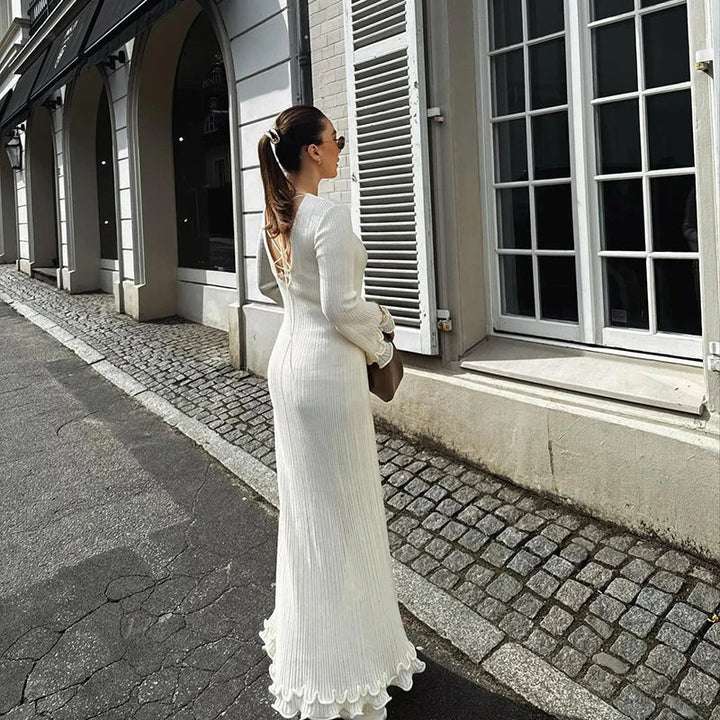 Charlotte Elegant maximekko litteillä hihoilla ja hienostuneella selkäyksityiskohdalla