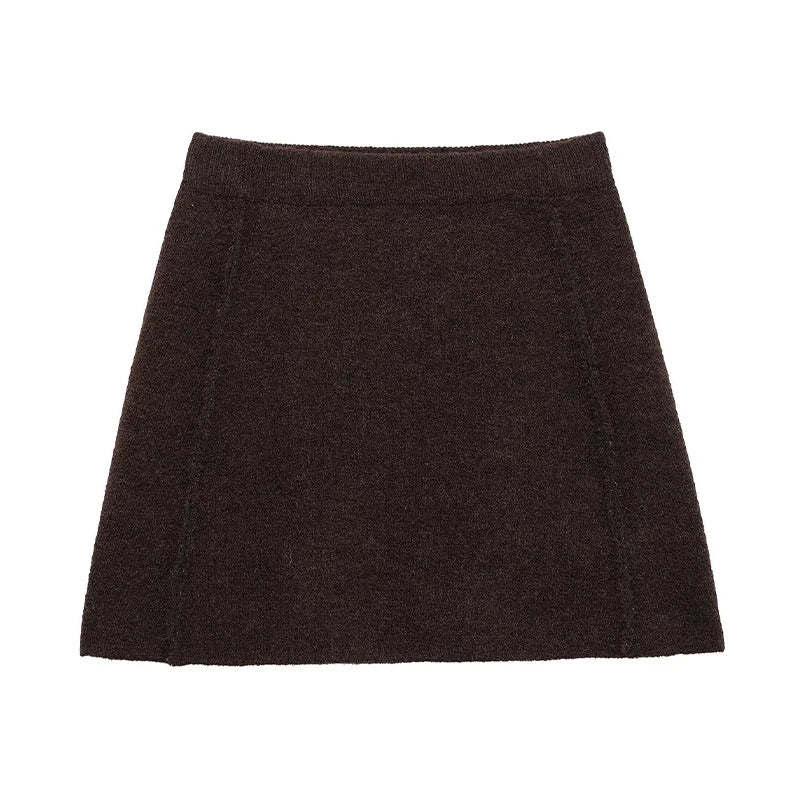 Brun uldnederdel til kvinder, kort A-line design, minimalistisk stil, perfekt til efterår og vintermode. Komfortabel og stilfuld beklædning.