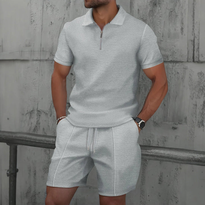 Hombres Europa y EE.UU. nuevo verano waffle liso cremallera solapa conjunto de manga corta con pantalones cortos dos piezas