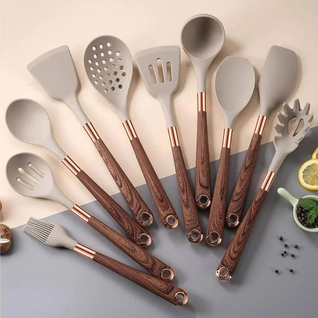 Heat resistant silicone spatula and cooking tools with ergonomic wood grain handles for everyday cooking.