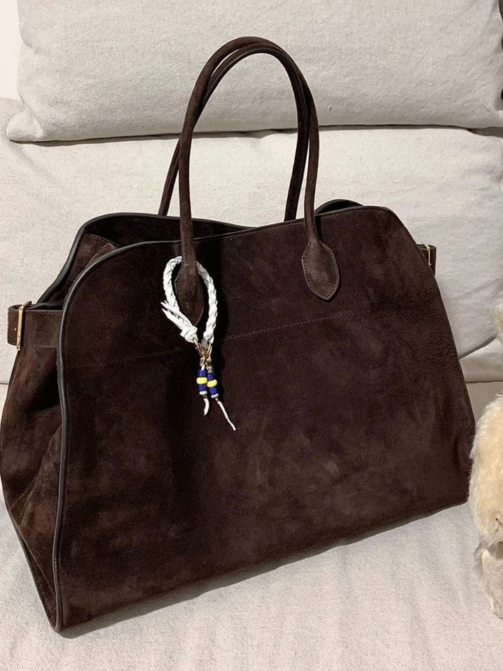 Bolsa feminina elegante em couro vegetal com um design espaçoso