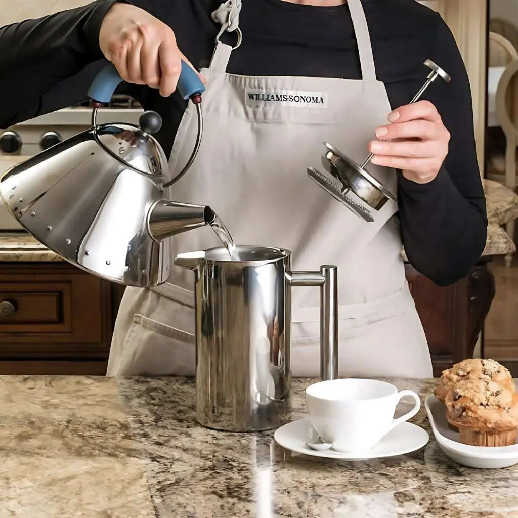 Double wall french press coffee maker with polished stainless steel finish and ergonomic handle