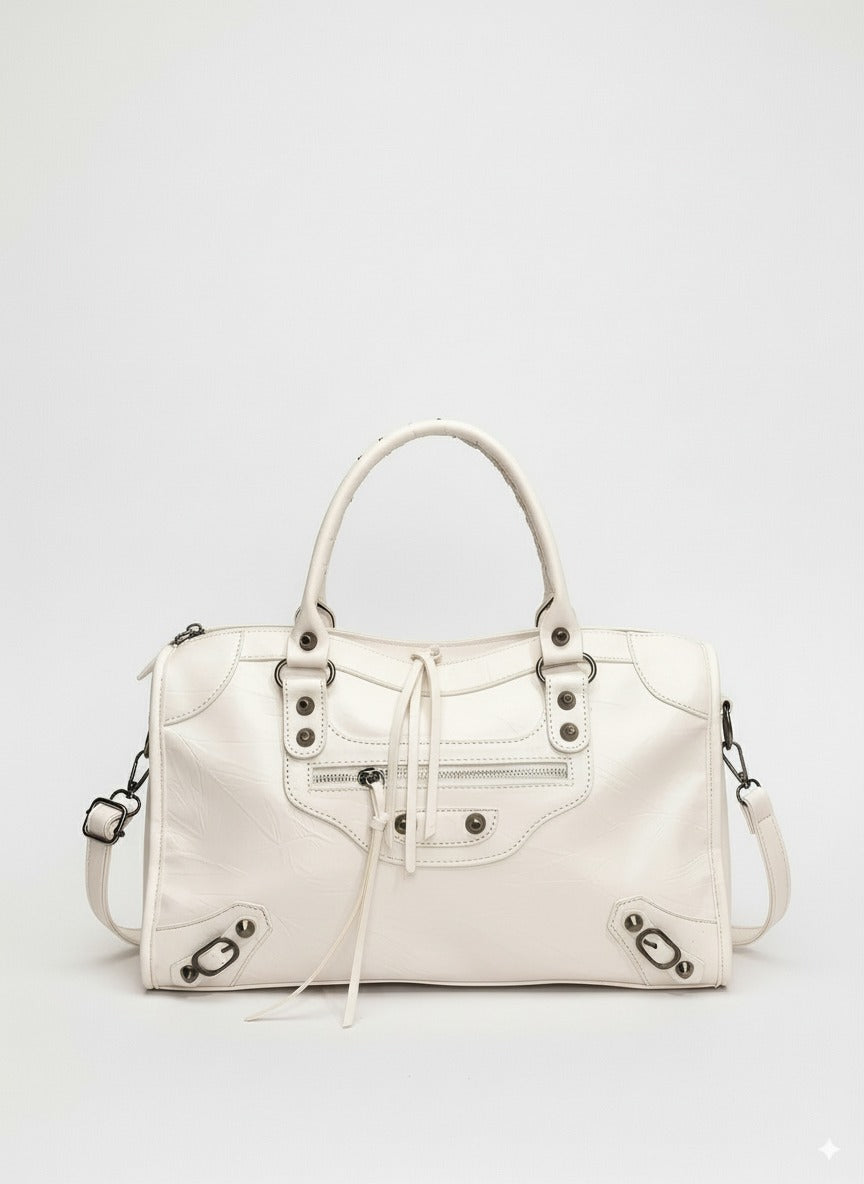 Hvid Balenciaga håndtaske med metalbeslag og justerbar skulderrem. Stilfuldt design, luksusmode, perfekt til moderne kvinde.