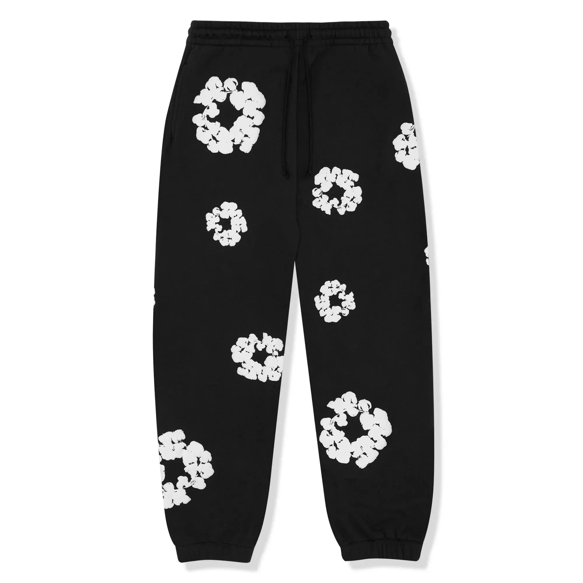 Sort sweatpants med hvide blomsterprint, elastisk talje og manchetter. Trendy streetwear bukser til mænd og kvinder. Komfortabelt og stilfuldt design.