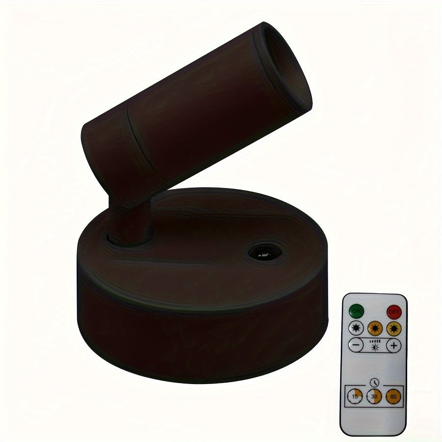 Sort LED-spotlys med fjernbetjening, justerbar vinkel, energibesparende belysning, ideel til indendørs brug, moderne design, nem installation.