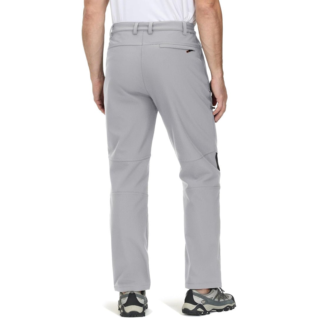 Water-resistant men's ski pants with fleece lining and reinforced knees for winter sports