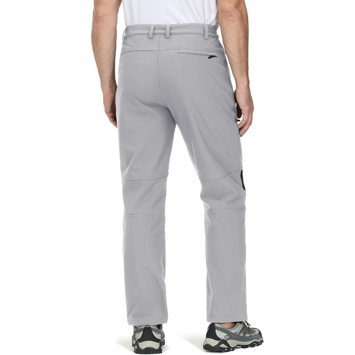 Water-resistant men's ski pants with fleece lining and reinforced knees for winter sports