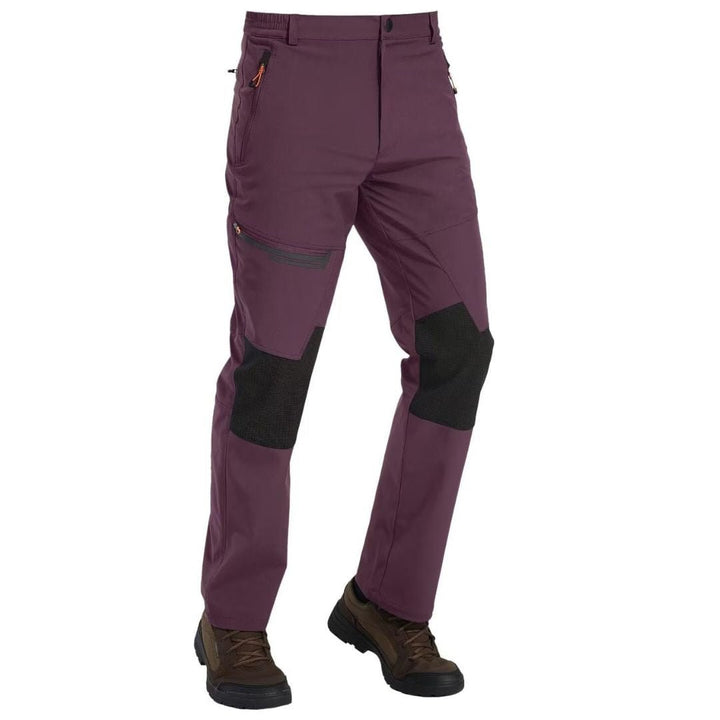 Water-resistant men's ski pants with fleece lining and reinforced knees for winter sports