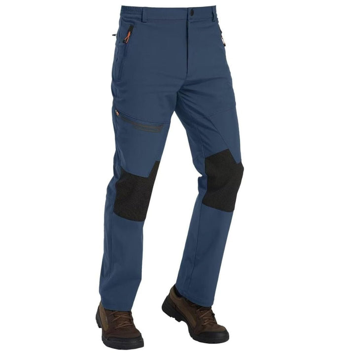 Water-resistant men's ski pants with fleece lining and reinforced knees for winter sports