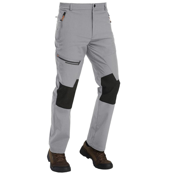Water-resistant men's ski pants with fleece lining and reinforced knees for winter sports