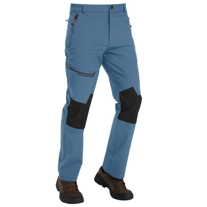 Water-resistant men's ski pants with fleece lining and reinforced knees for winter sports