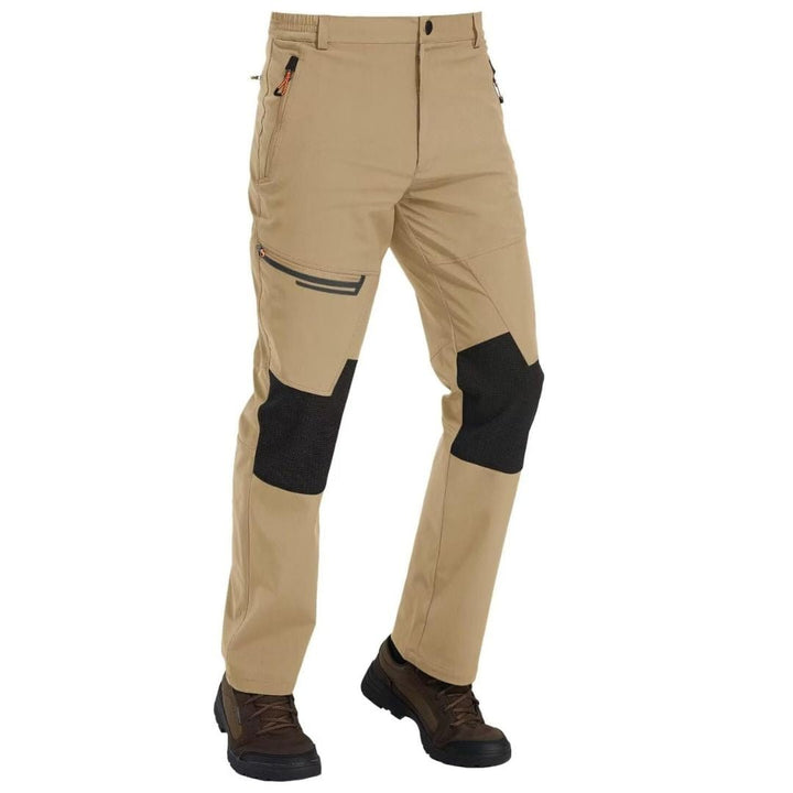 Water-resistant men's ski pants with fleece lining and reinforced knees for winter sports