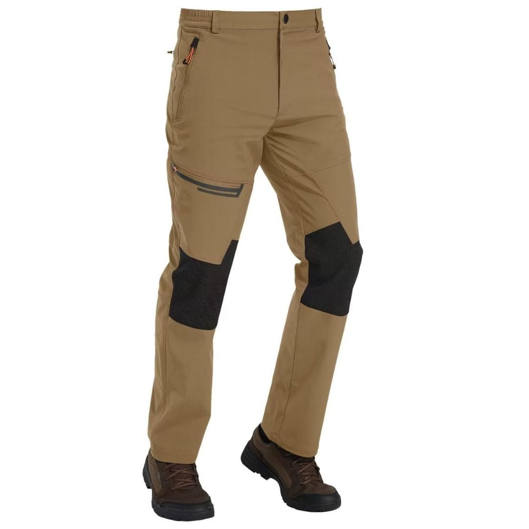 Water-resistant men's ski pants with fleece lining and reinforced knees for winter sports