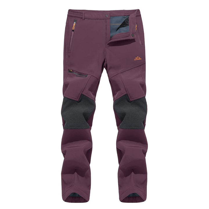 Water-resistant men's ski pants with fleece lining and reinforced knees for winter sports