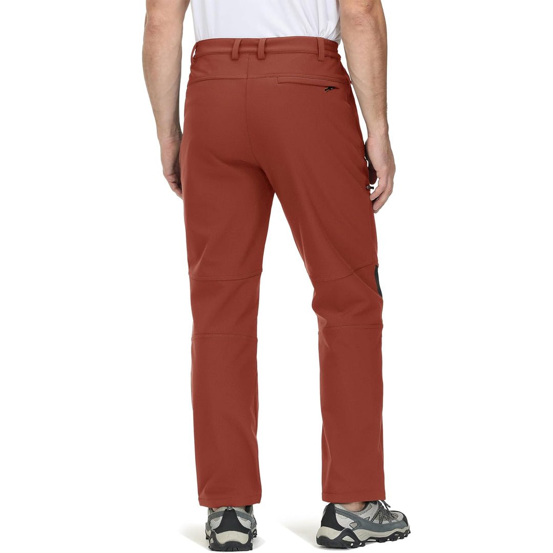 Water-resistant men's ski pants with fleece lining and reinforced knees for winter sports