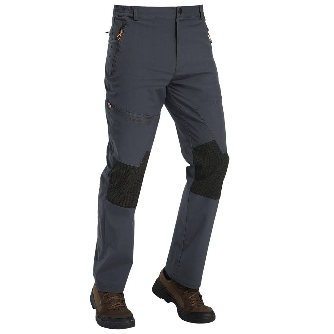 Water-resistant men's ski pants with fleece lining and reinforced knees for winter sports