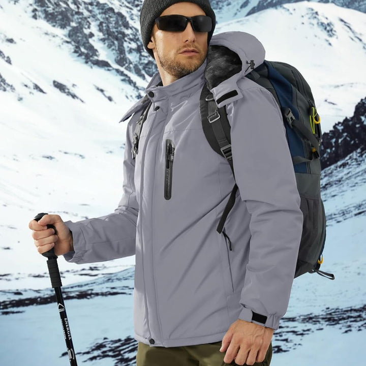 Vindtæt vinterjakke til mænd med varmt fleecefoer og aftagelig hætte til udendørsbrug