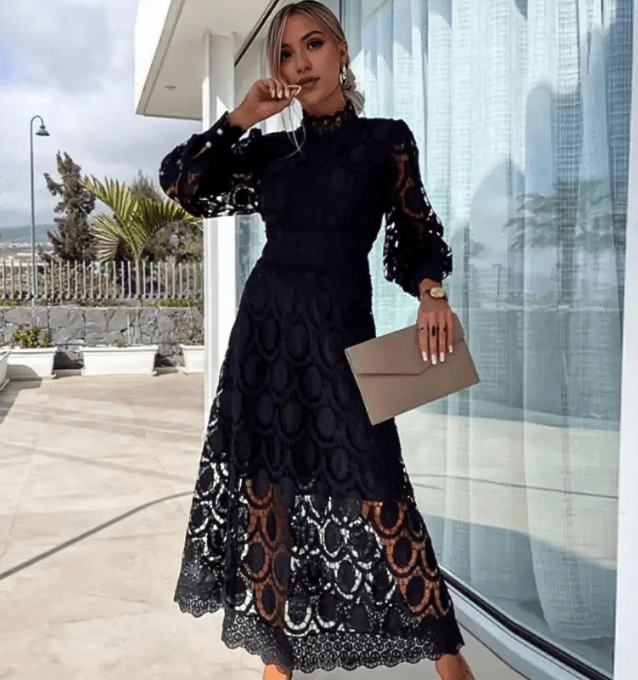 Mia Elegant vaaleanpunainen mekko midi-leikkauksella, korkealla kauluksella ja puffihihoilla