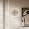 Möni | Stone wall lamp and clock for elegant lighting
